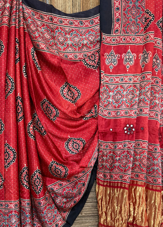 RED AJRAKH HANDCRAFTED MIRROR WORK MODAL SILK SARI WITH ZARI PALLU