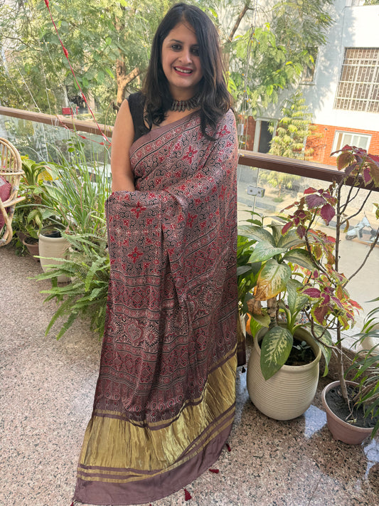 Chikoo brown ajrakh modal silk sari with zari pallu
