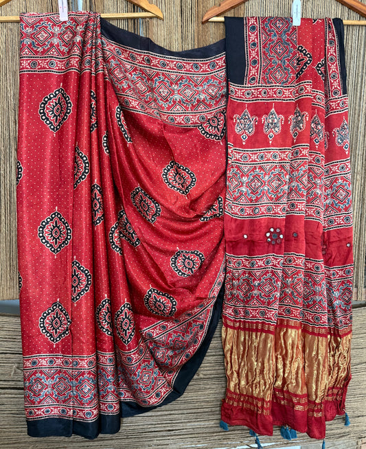 RED AJRAKH HANDCRAFTED MIRROR WORK MODAL SILK SARI WITH ZARI PALLU