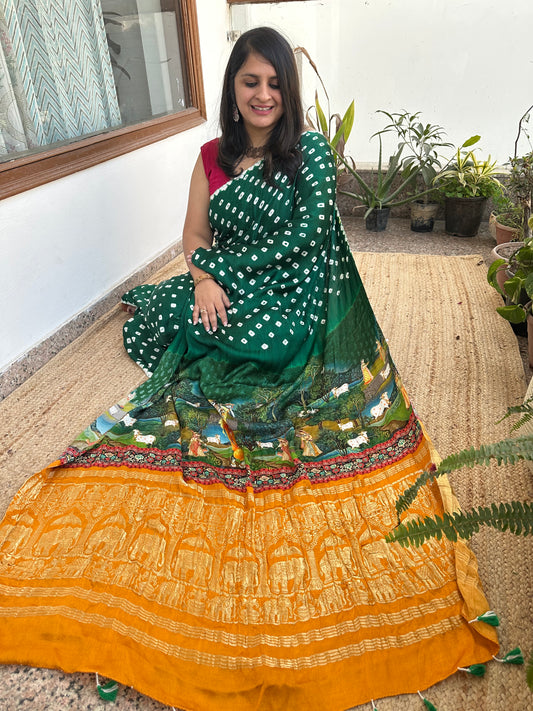 Bottle green modal silk bandhani sari with pichwai print