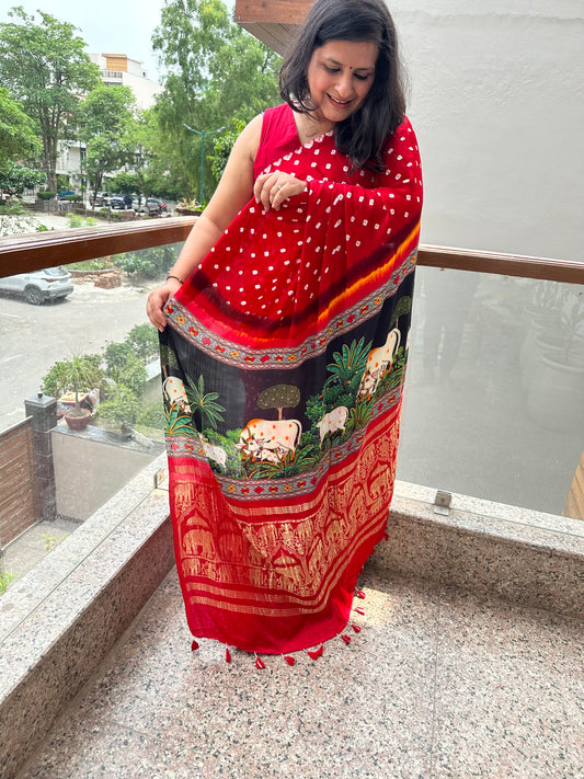 Red modal silk bandhani handcrafted with pichwai print sari in nakshi elephant border