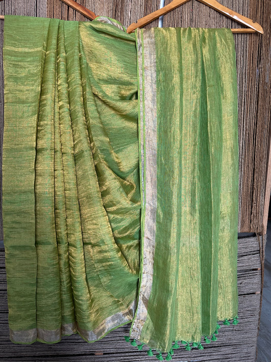 Pear green golden metallic linen sari with woven border