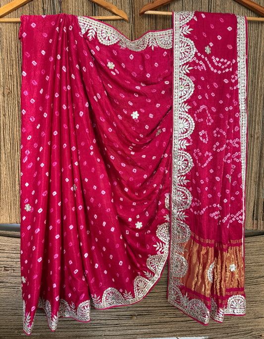 Fuchsia pink rai bandhani modal silk sari with handembroidery gotta patti