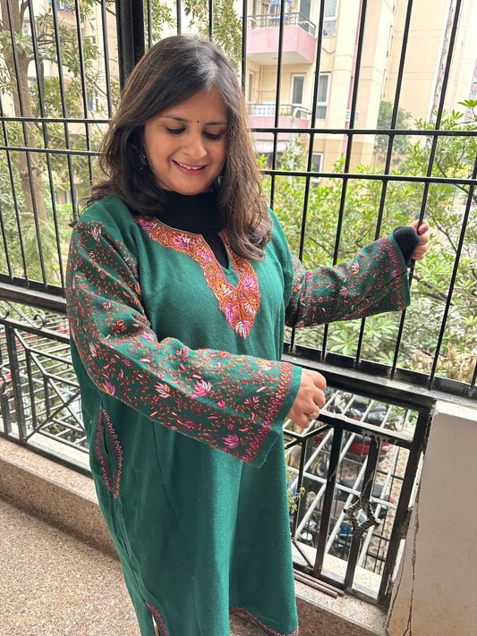 Green elegant raffal pheran with jaal embroidery and hand sozni work