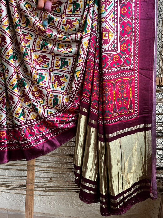 Maroon modal silk patola print sari with zari border pms- 1014