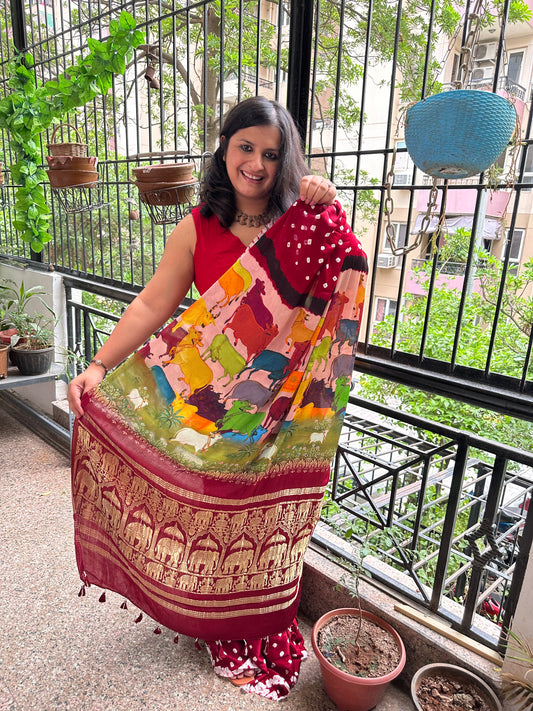 Maroon modal silk bandhani  handcrafted with pichwai print sari in nakshi elephant  border