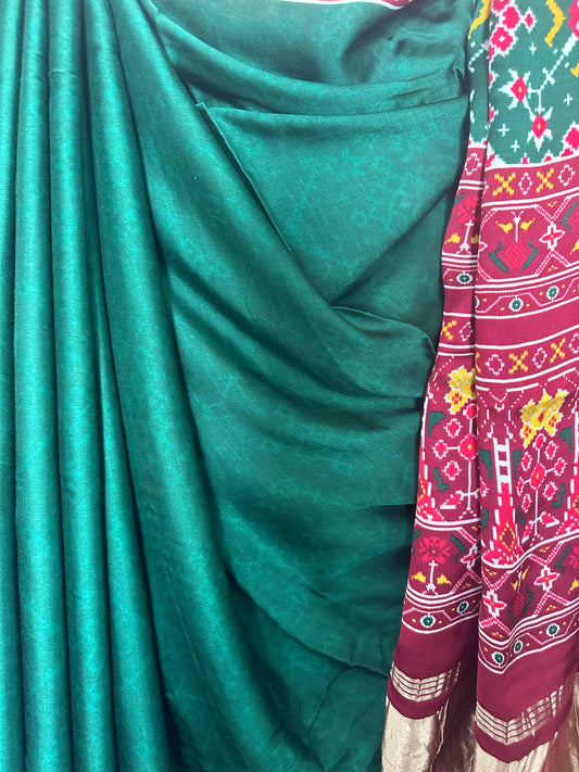 Green  modal silk patola print sari with zari border pms- 1029