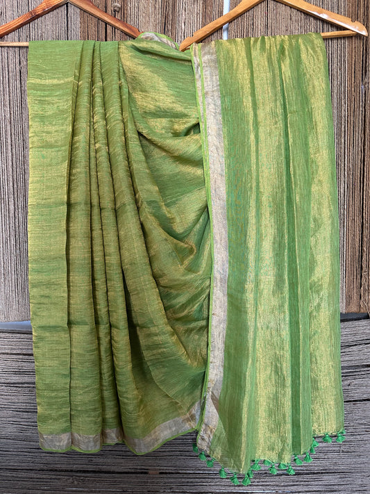 Pear green golden metallic  linen sari with woven  border