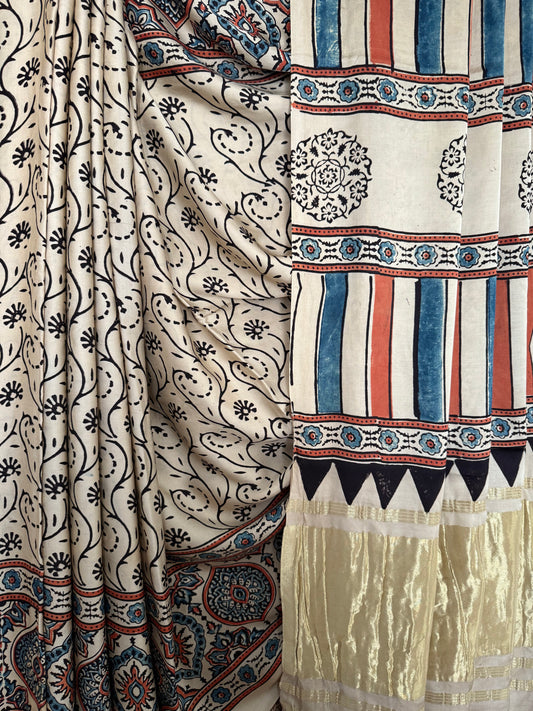 Beige ajrakh modal silk sari with zari pallu