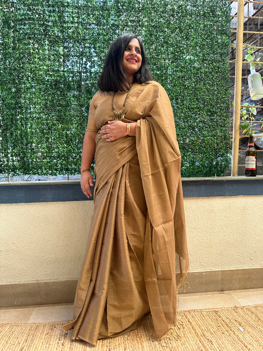 Copper tissue zari sari with woven contrast blouse