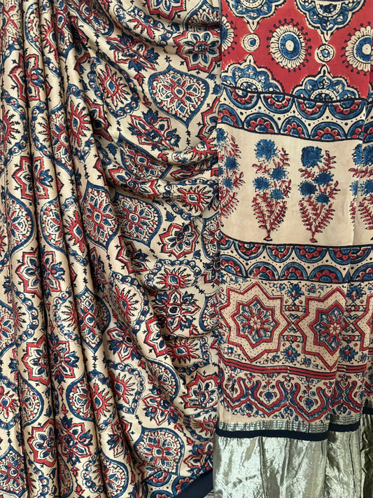 Ivory badam butta ajrakh modal silk sari with zari border