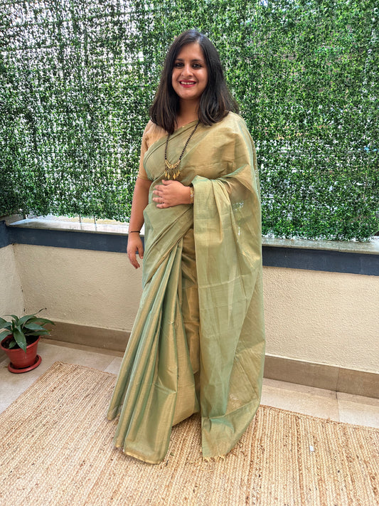 Teal blue tissue zari sari with woven contrast blouse