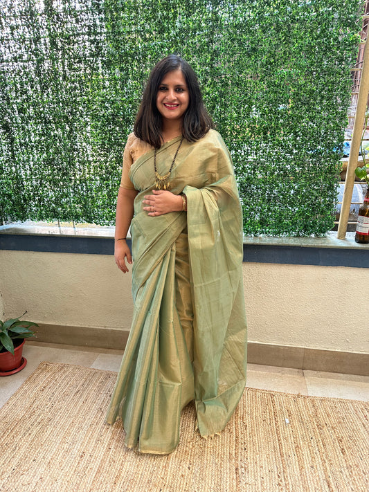 Teal blue tissue zari sari with woven contrast blouse