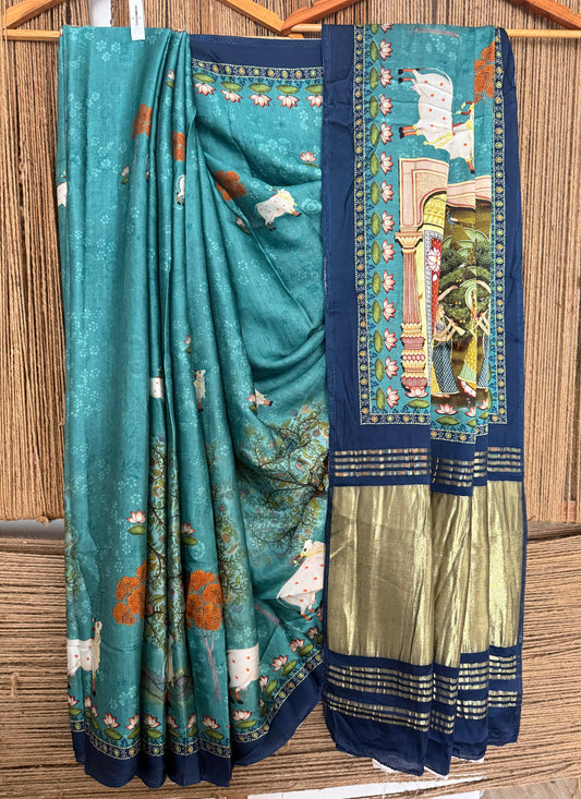 Turquoise blue pichwai modal silk print sari with zari border pms- 1034
