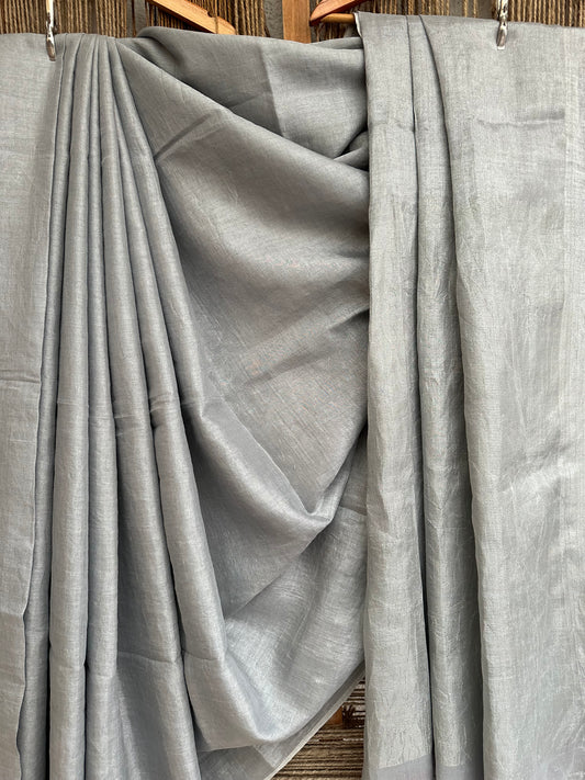 Silver tissue linen zari sari with woven yellow border &amp;  tassels