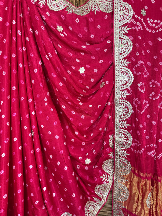 Fuchsia pink rai bandhani modal silk sari with handembroidery gotta patti