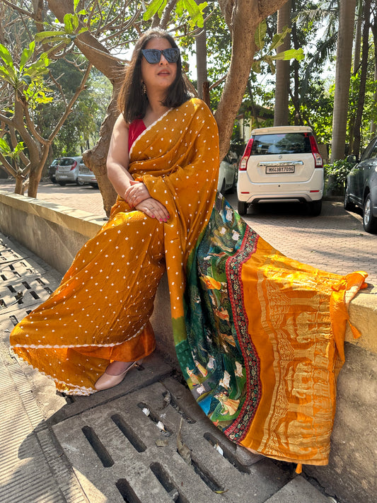 Mustard yellow modal silk bandhani  sari with pichwai print bps