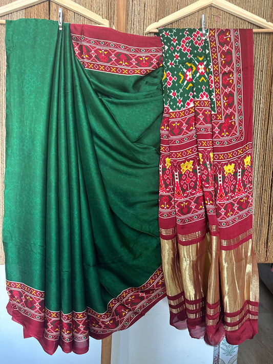 Green  modal silk patola print sari with zari border pms- 1029