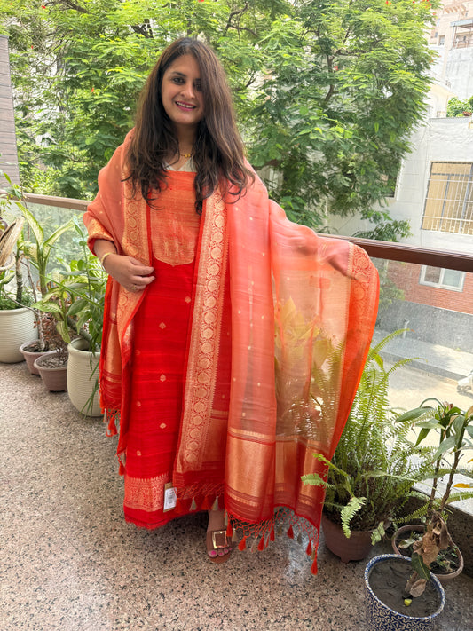 Vermilion red raw silk certified handloom banarsi kadwa butti with woven zari three piece suit