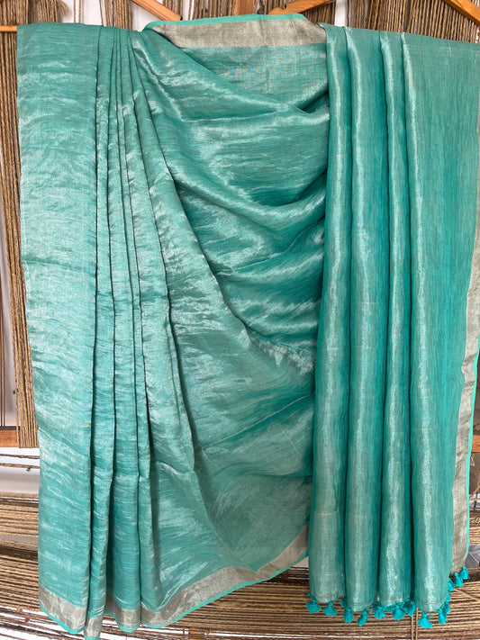 Cyan blue metallic linen sari with silver woven  border and tassels