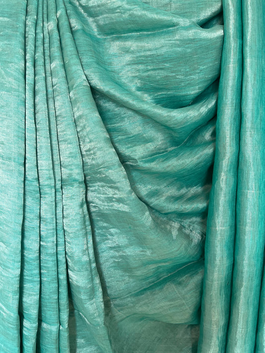 Cyan blue metallic linen sari with silver woven  border and tassels