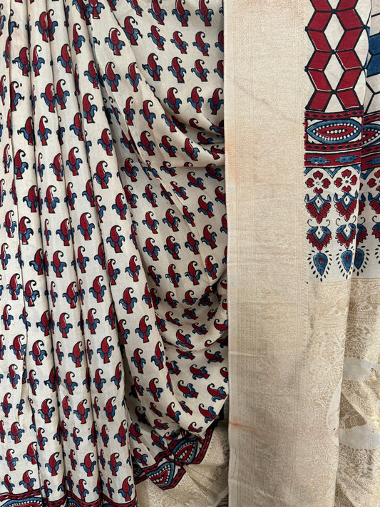 Beige golden dola  silk ajrakh zari border sari