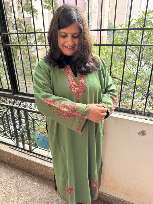 Light green elegant raffal pheran with jaal embroidery and hand sozni work