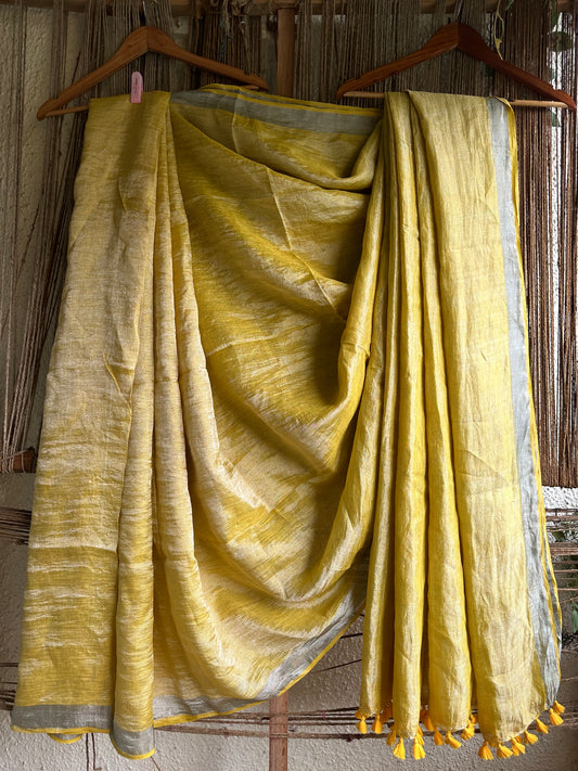 Golden yellow metallic  linen sari with woven  border &amp;  tassels