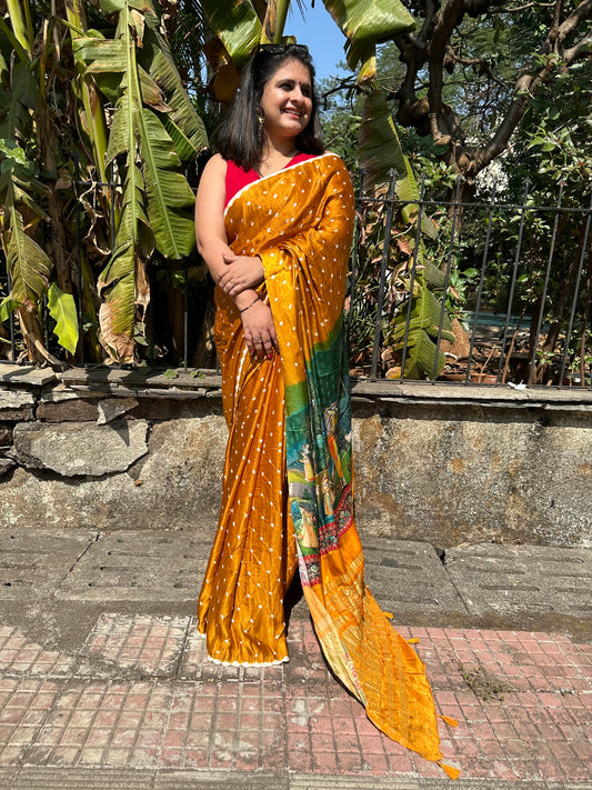 Mustard yellow modal silk bandhani  sari with pichwai print bps