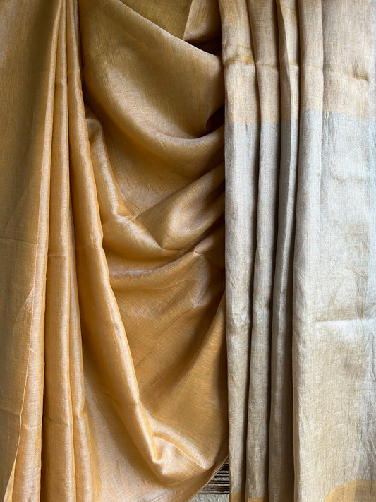 Golden linen zari sari with woven white border &amp;  tassels