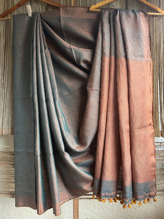 Blue tissue  linen tissue sari with zari woven border & white tassels and palla