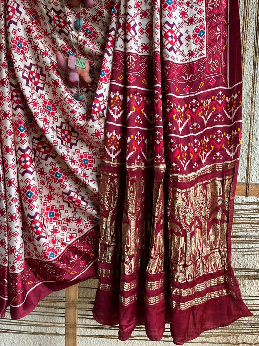 Maroon cream modal silk patola print sari with zari border pms- 1012